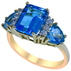 14 Karat Blue Topaz and Diamond Ladies Ring 14 Karat Blue Topaz and Diamond Ladies Ring