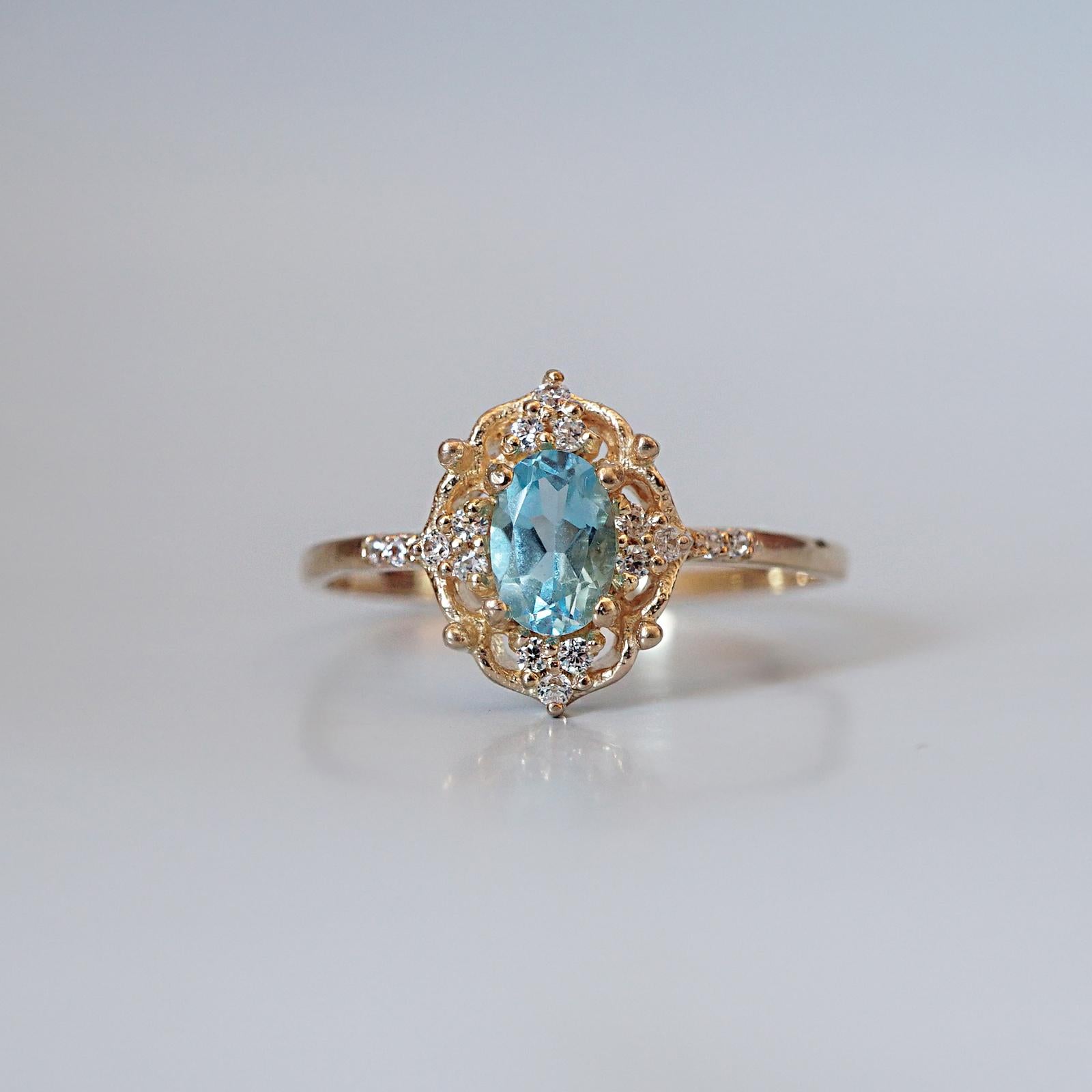 **This item is specially made for you. Please allow 1-2 week lead time. Make a note of your ring size during checkout. 

We all shine on like the moon and the stars and the sun.... Stare into the Cosmic Topaz ring and you might just see another