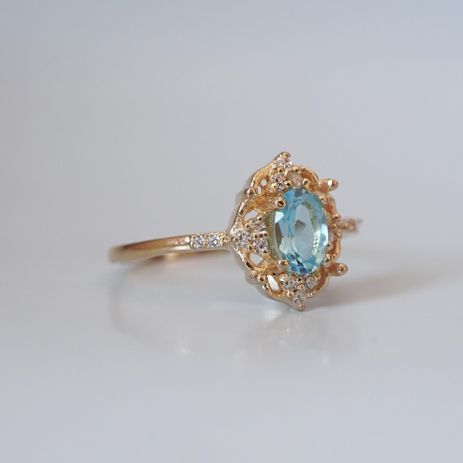 Contemporary 6x4MM Blue Topaz Diamond Yellow Gold Ring For Sale