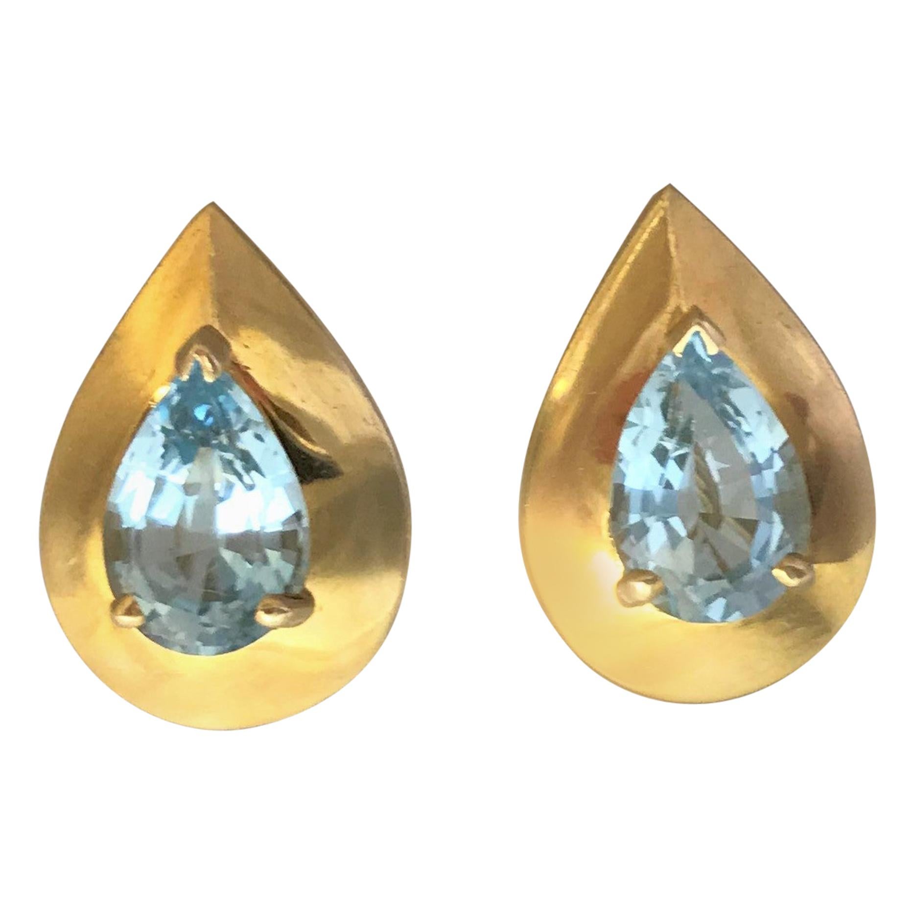 14 Karat Blue Topaz Pear Shape Earrings