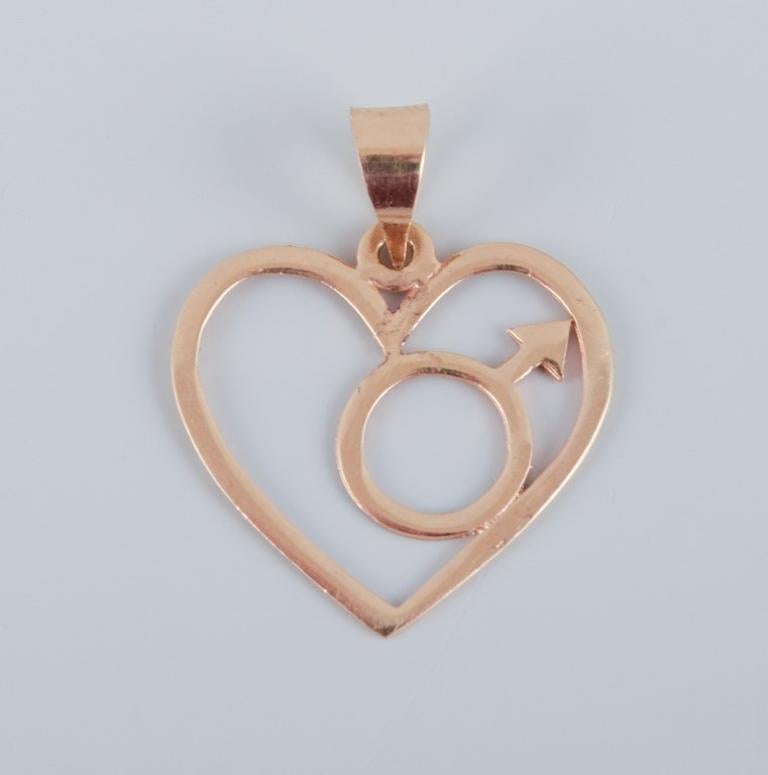 Modern 14 karat Chanti gold pendant in the shape of a heart with a male symbol.  For Sale