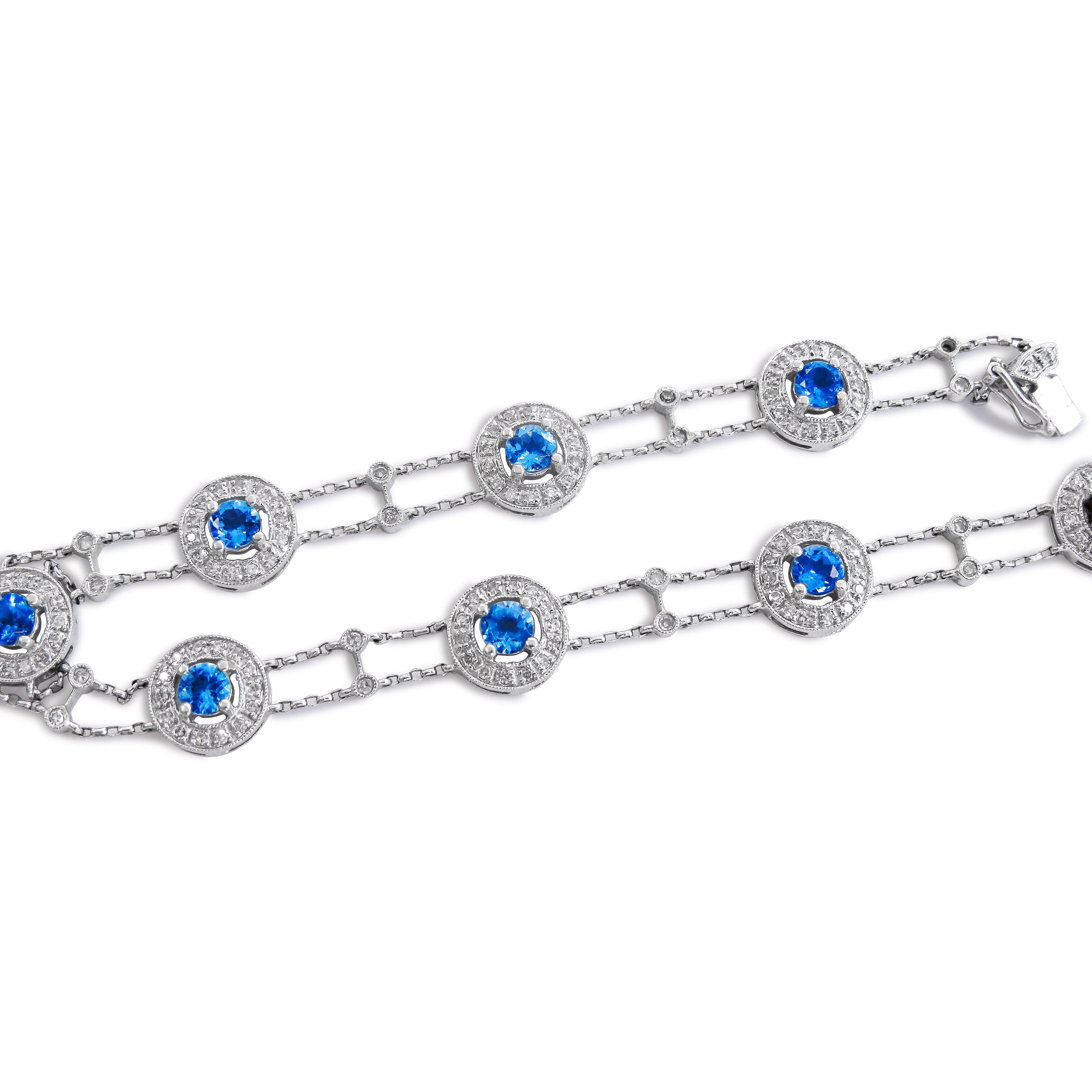 14K White Gold 
Weight= 9.5gr 
Length= 8 Inches  
Diamond= 1/2 Ct total 
Blue Topaz= 2 1/2 Ct total 
Year= 2000 