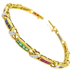 14 Karat Diamond , Ruby, Sapphire, Emerald Ladies Bracelet