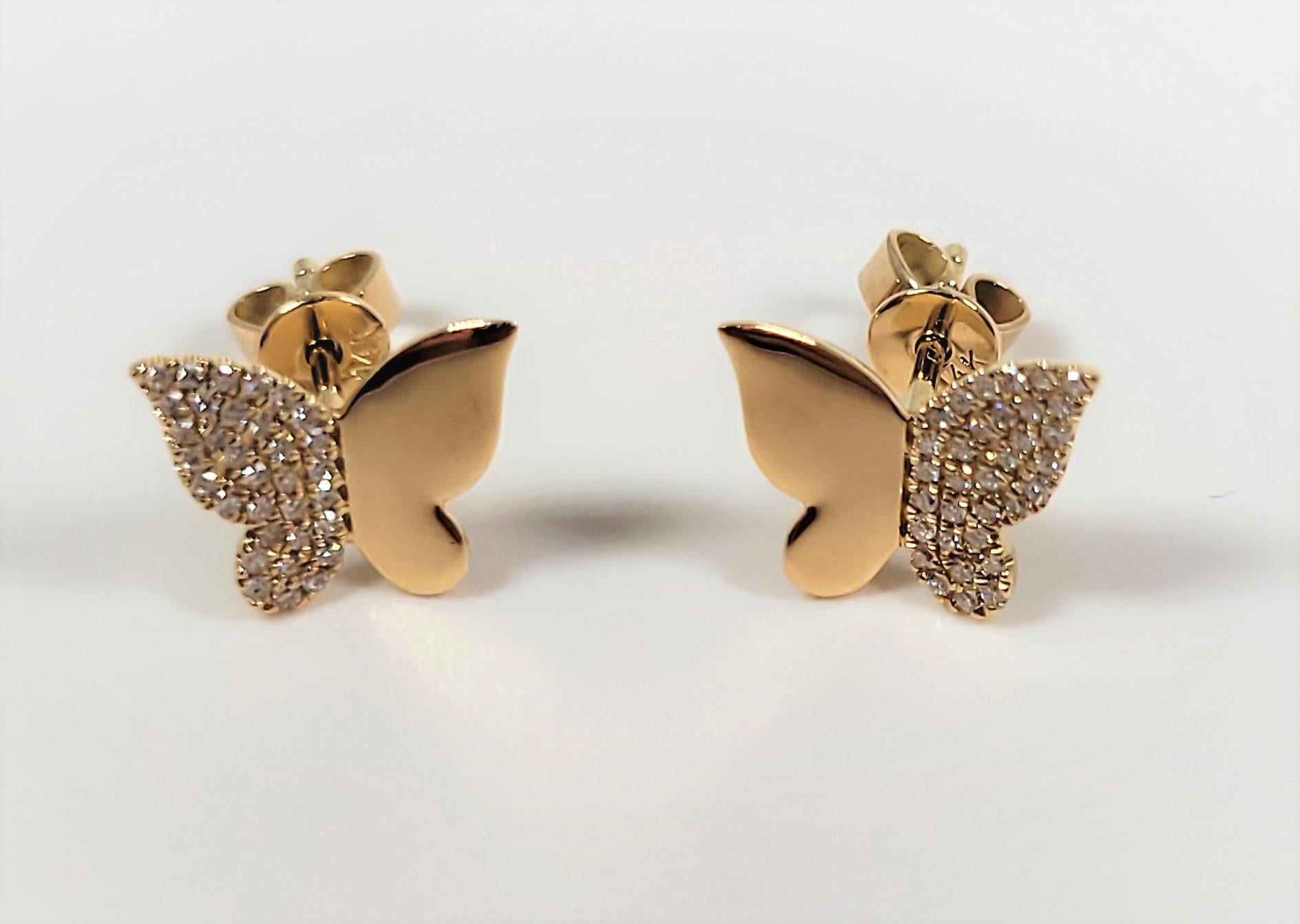 0.53 carats of diamonds just sparkle in these 14 karat, yellow gold, butterfly shaped earrings!!