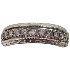 14 Karat Diamond Eternity Ring with Hand Engraved Rings