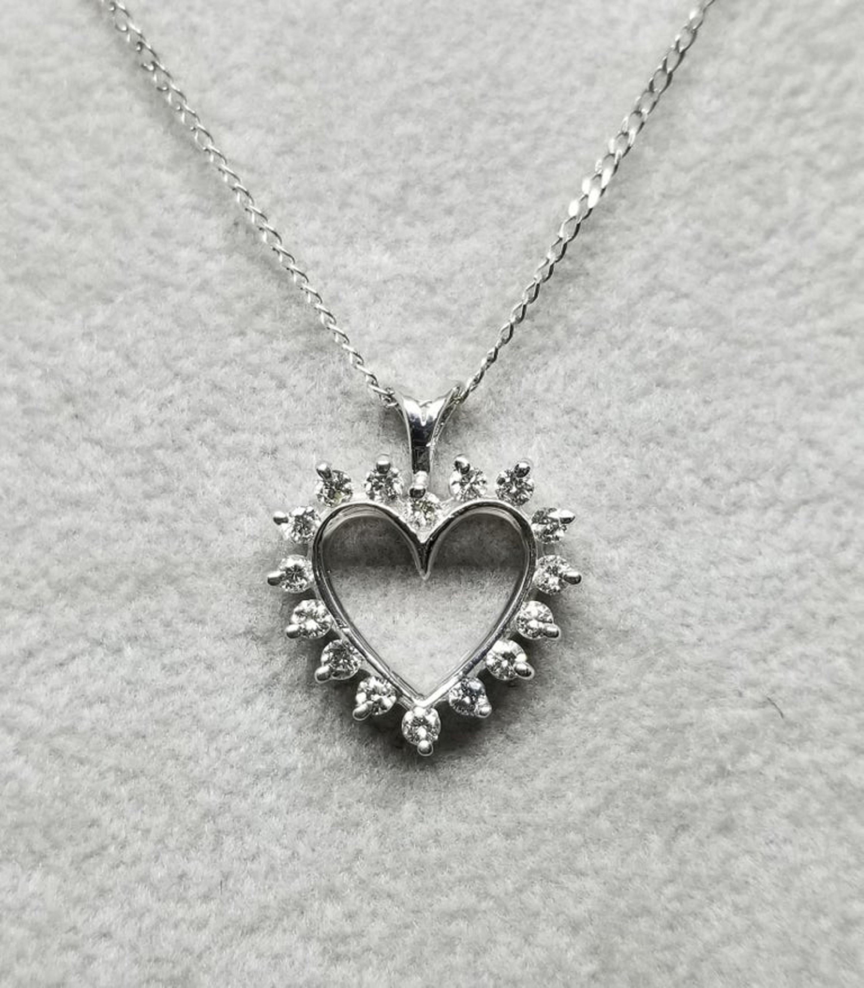 Contemporary 14 Karat Diamond Heart Pendant .25pts. For Sale