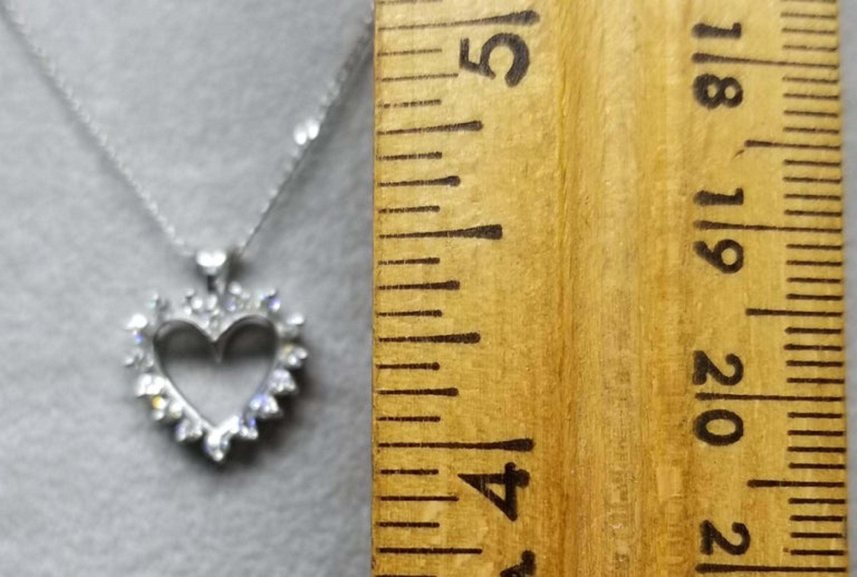 Round Cut 14 Karat Diamond Heart Pendant .25pts. For Sale