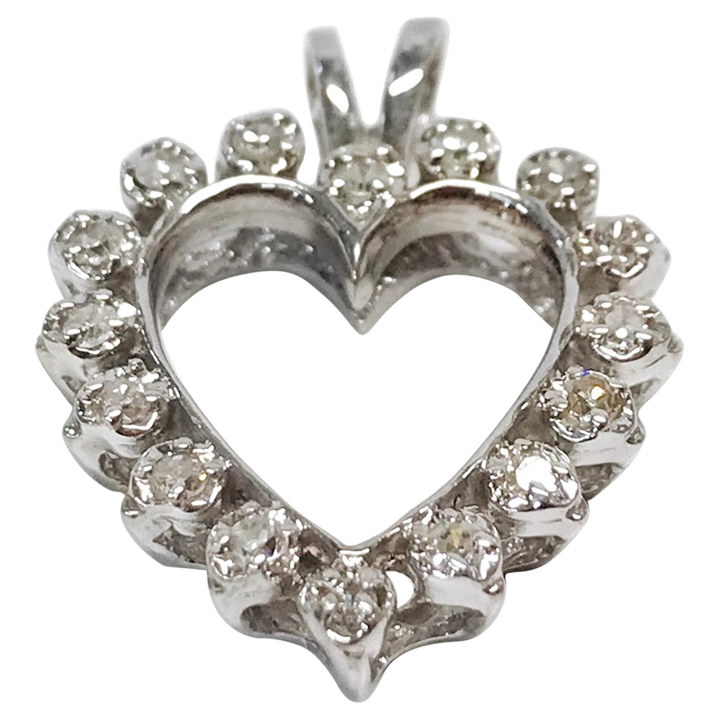 14 Karat Diamond Heart Pendant For Sale