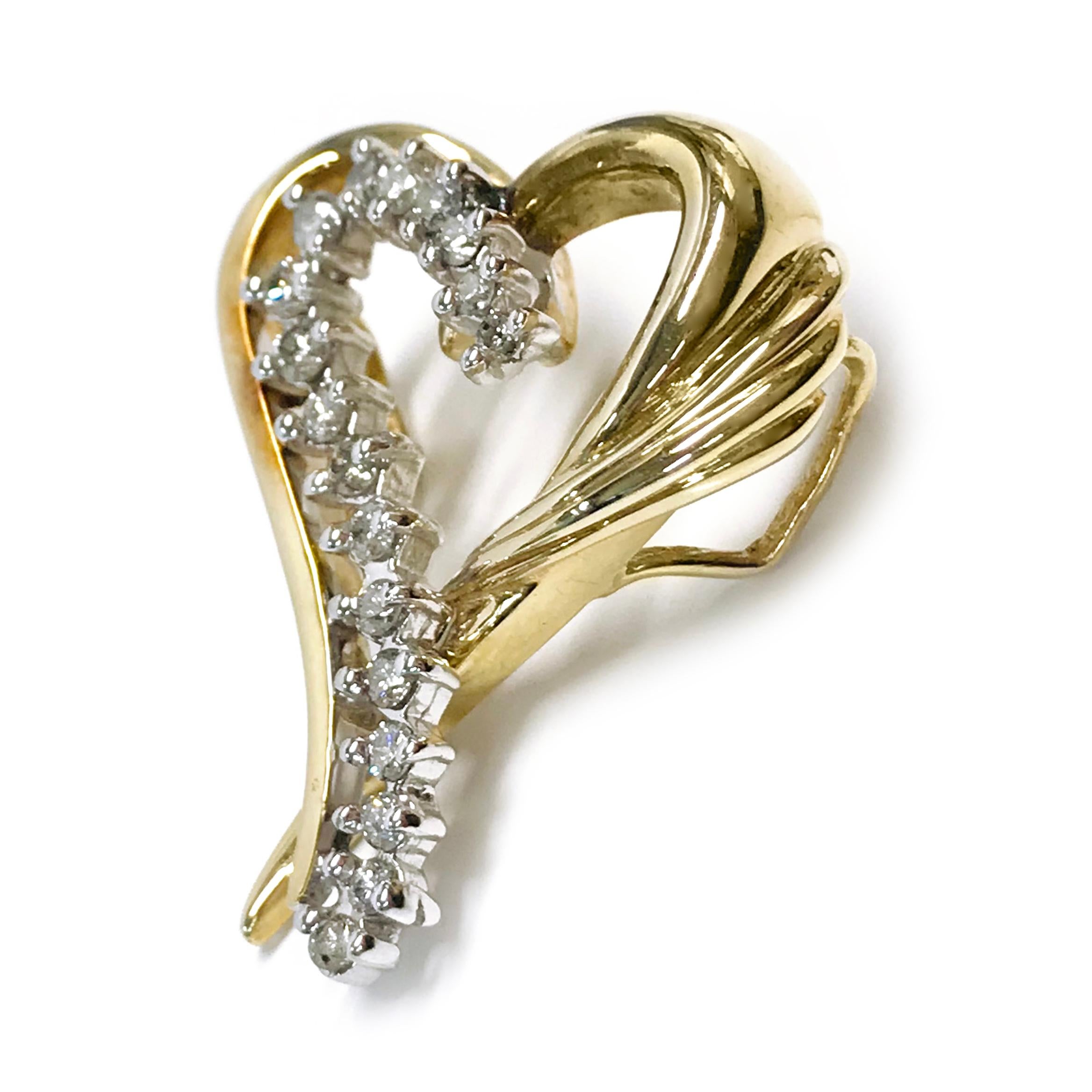Rétro Pendentif en forme de cœur en or 14 carats et diamant en vente