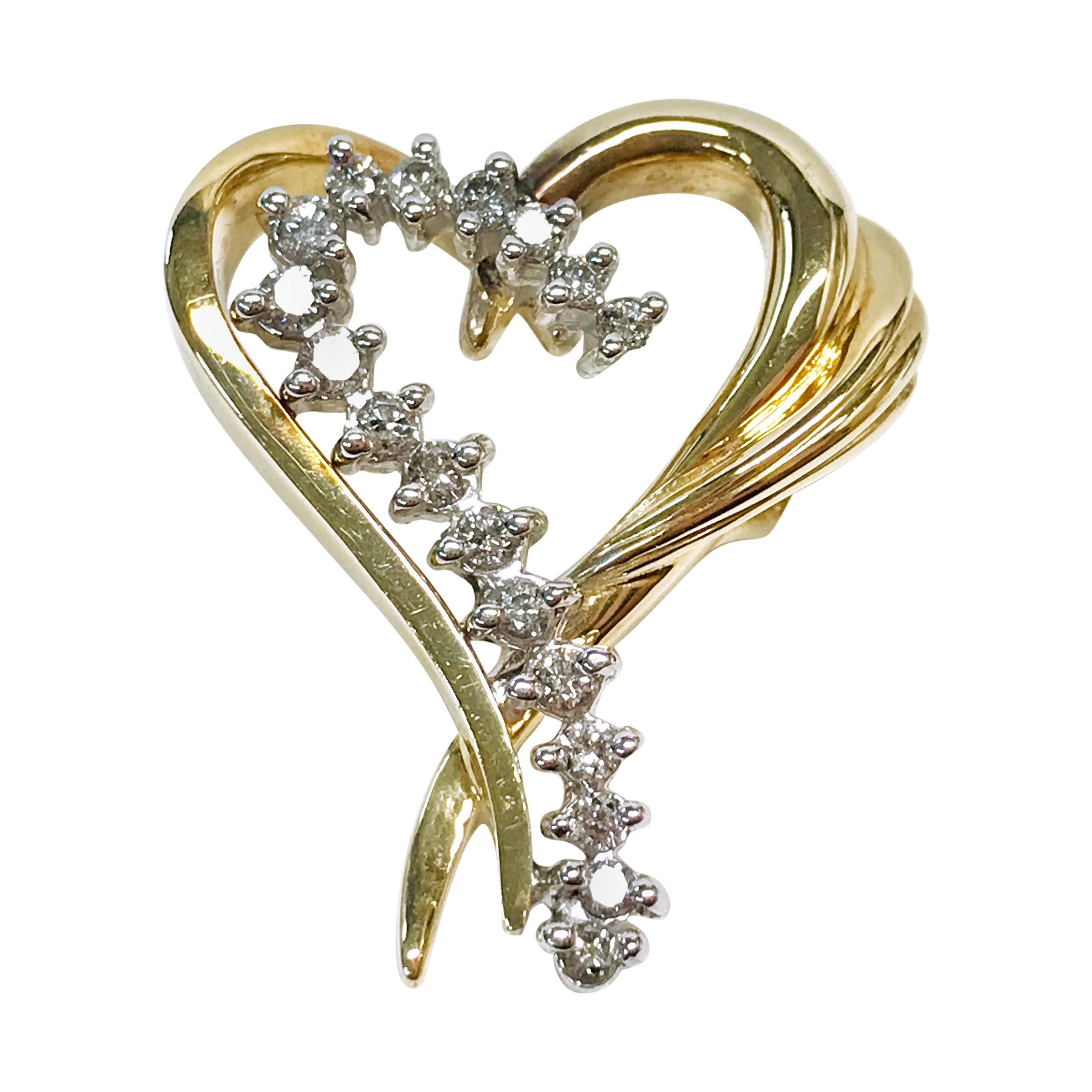 Pendentif en forme de cœur en or 14 carats et diamant en vente