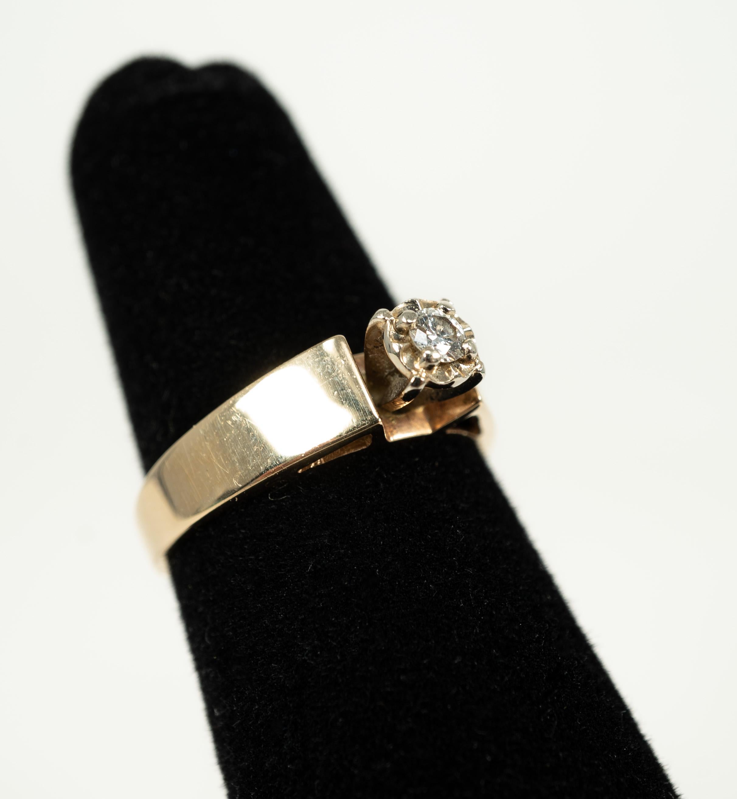 In 14 karat yellow gold, this 0.10 carat round diamond is a sparkler!