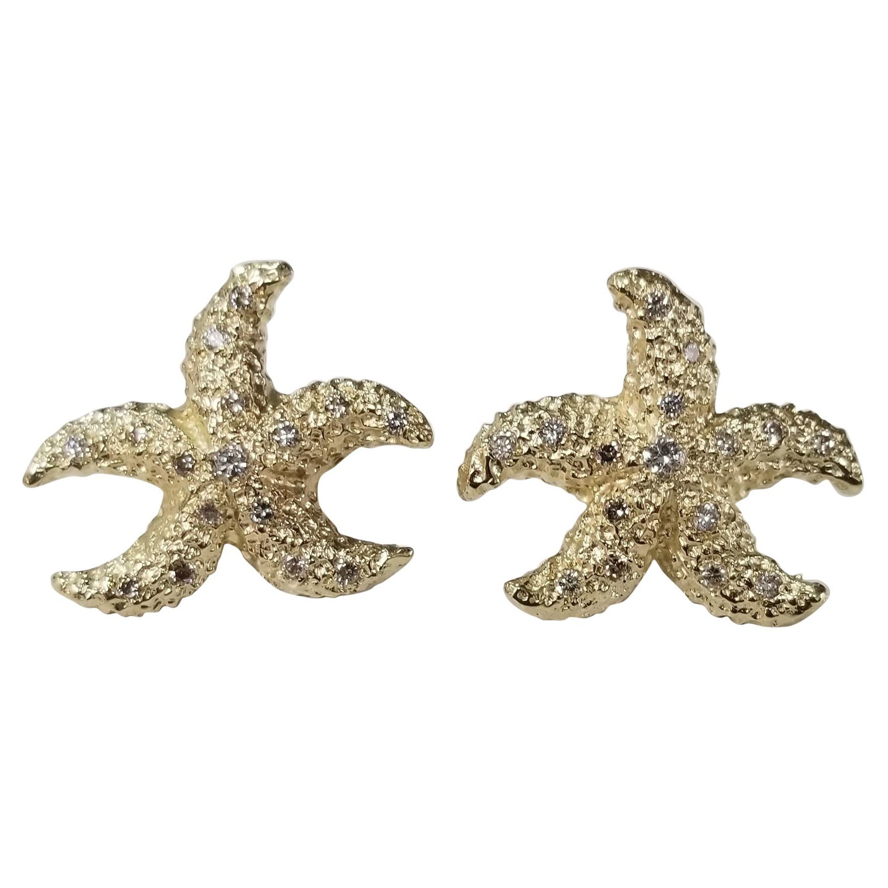 Orecchini "Stella di mare" con diamante 14 carati