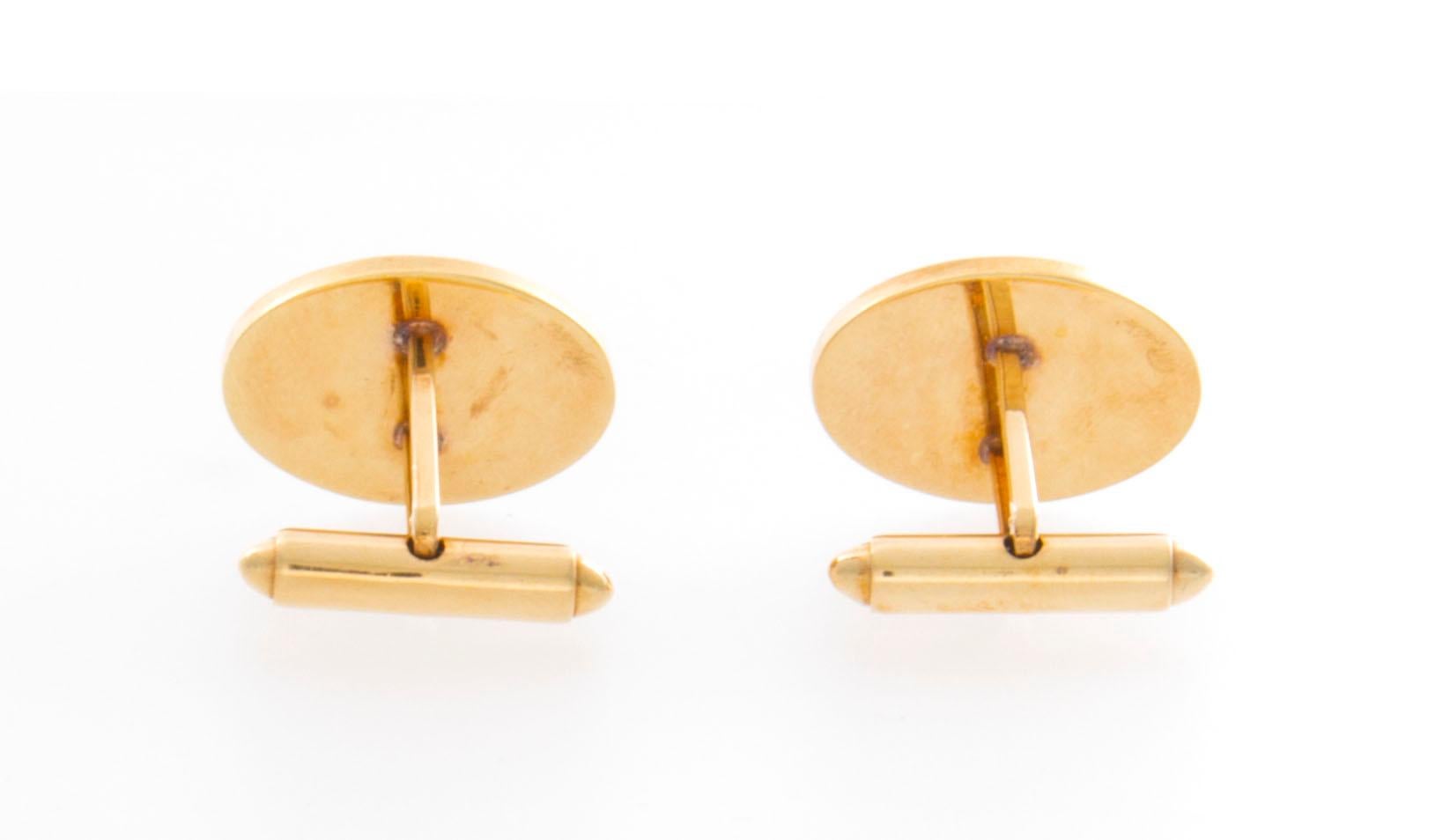 Men's 14 Karat Disc Cufflinks with a Flying Duck Motif and Toggle Backs