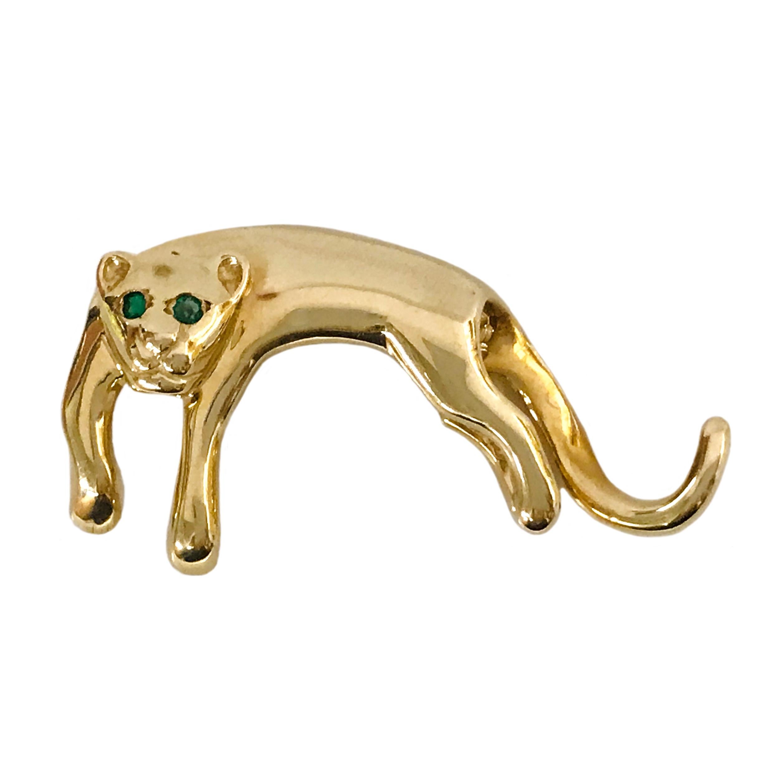 14 Karat Emerald Panther Slide Pendant. This big cat will slide into a necklace or bracelet and go with you anywhere. An Emerald is flush-set in each eye for added detail. The pendant measures 34.6mm wide x 18.5mm tall. 14K and the Italian star. The