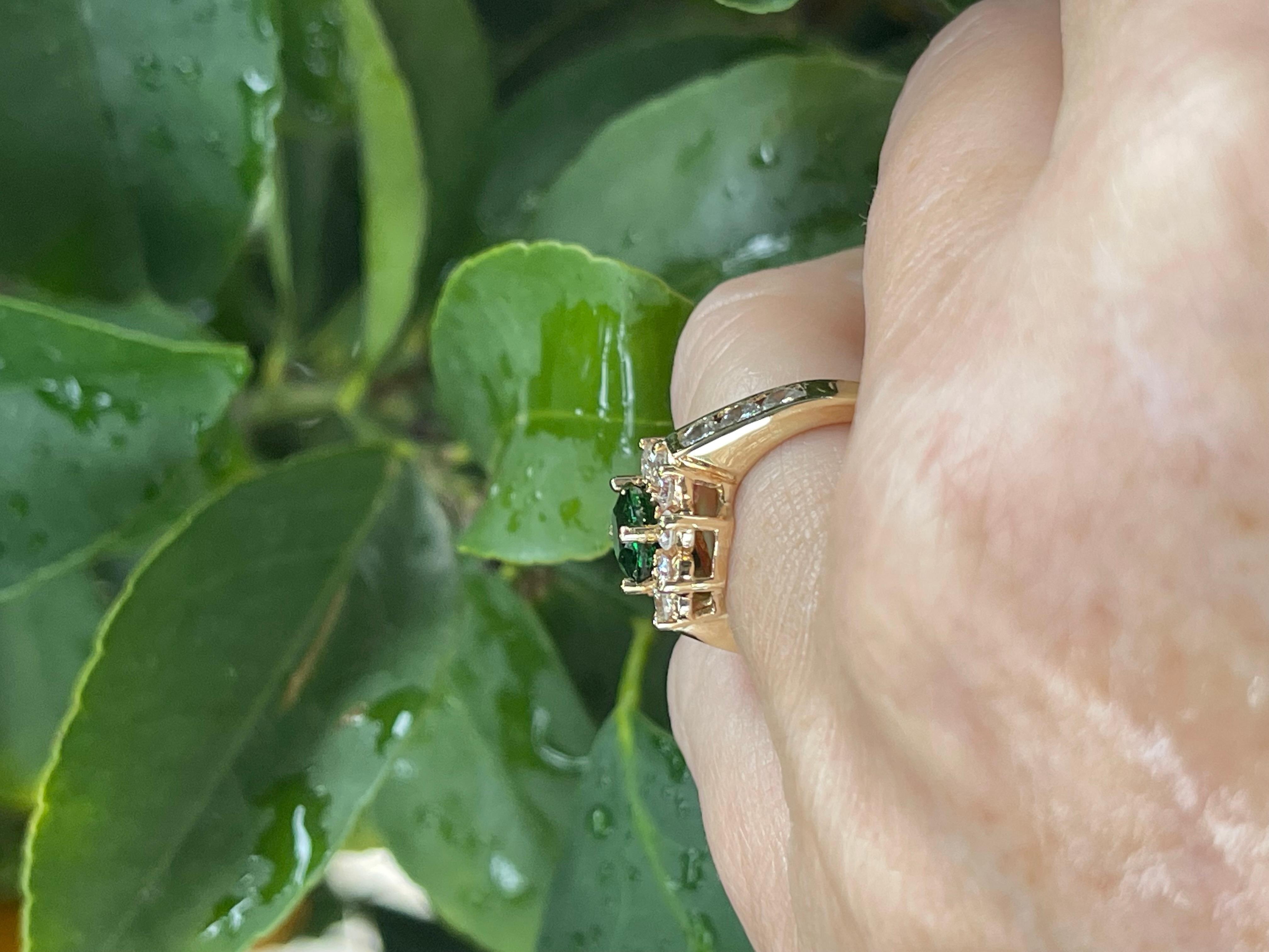 Oval Cut 14-karat estate Tsavorite Garnet Ring with Diamonds For Sale