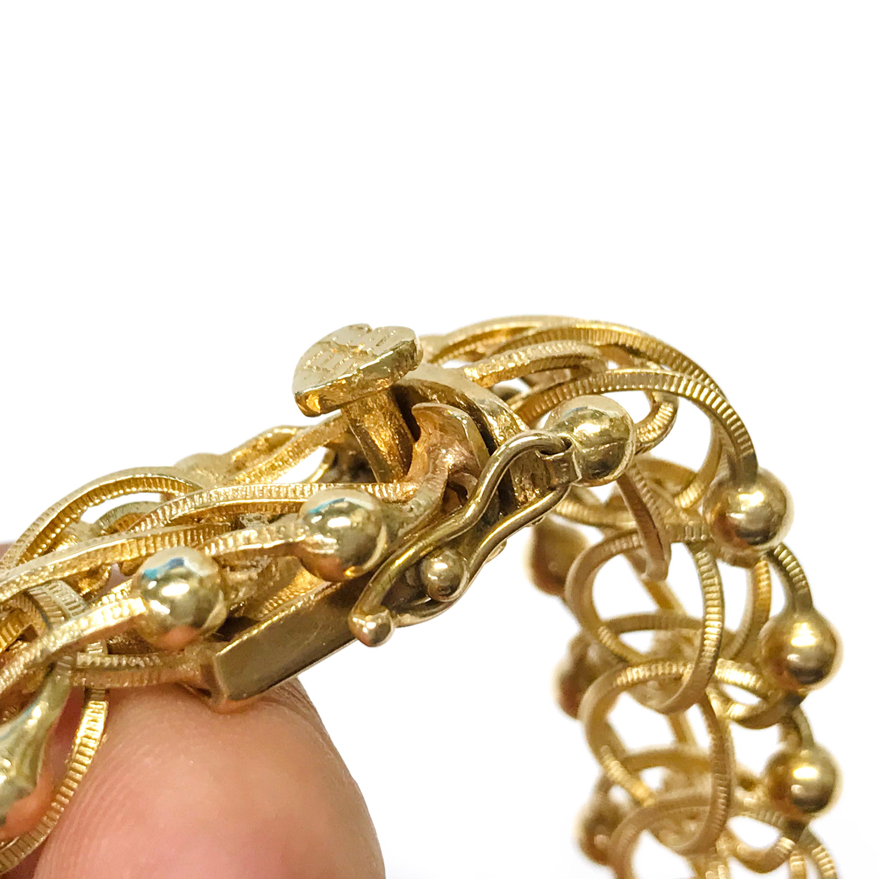 Bracelet à breloques à maillons fantaisie en or 14 carats en vente 1