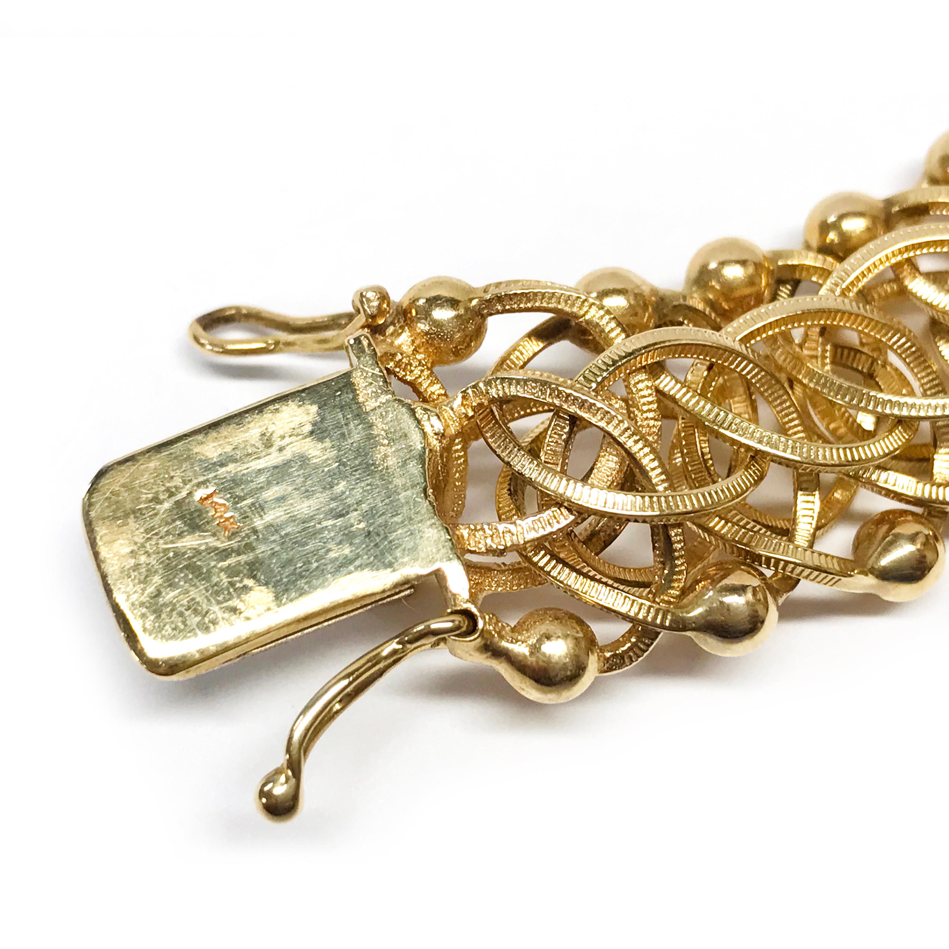 Bracelet à breloques à maillons fantaisie en or 14 carats en vente 2
