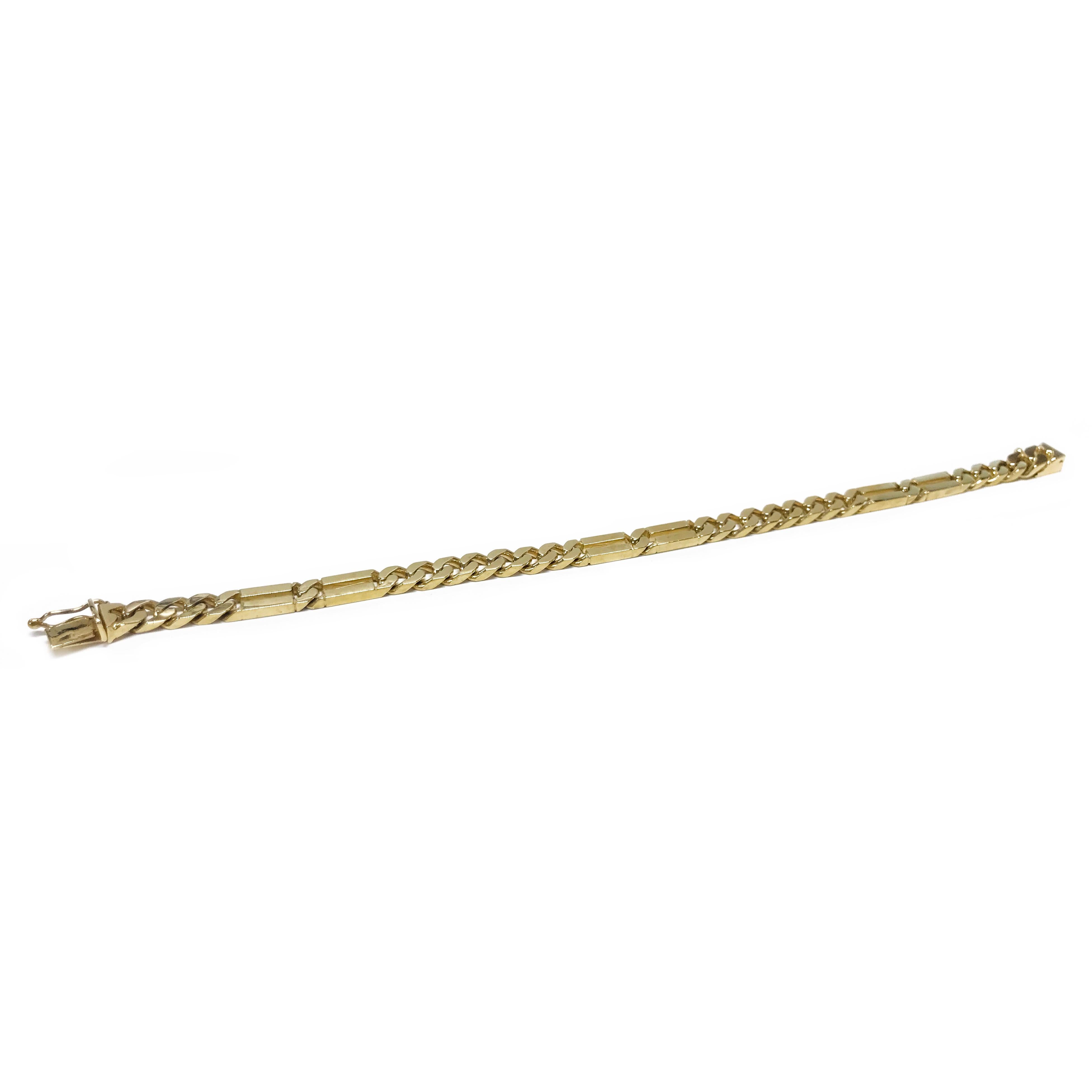 14 Karat Flat-Figaro Link Bracelet. This classic bracelet features 6mm flat-Figaro links. The top of the long links is a shiny finish while the bottom is a matte finish, the shorter links are shiny all around. The bracelet is 8