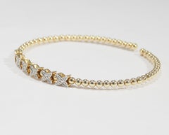 14 Karat Flexible Diamond Bangle Star Cluster Yellow Gold 0.10 Carat