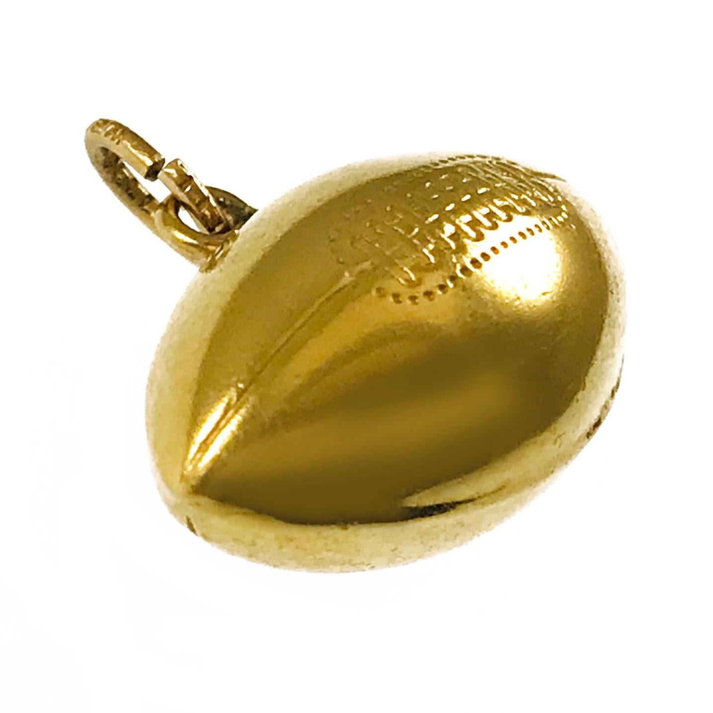 gold football pendant necklace