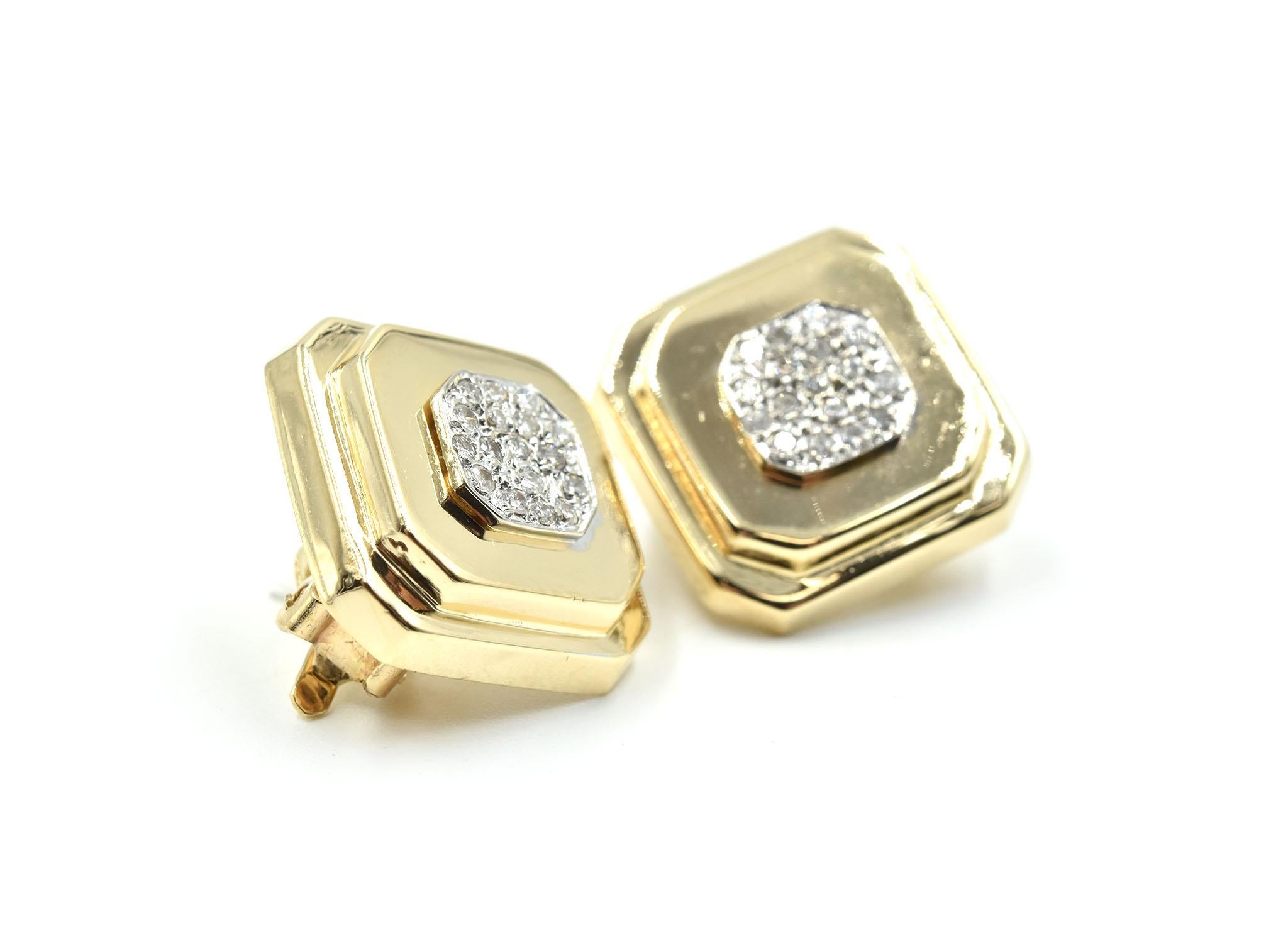 This pair of earrings are accomplished with dazzling diamonds! These earrings are made in 14k yellow gold with clusters of round diamonds. Each earring is made with a square shaped mount with cut corners in a high polish. In total, the earrings are
