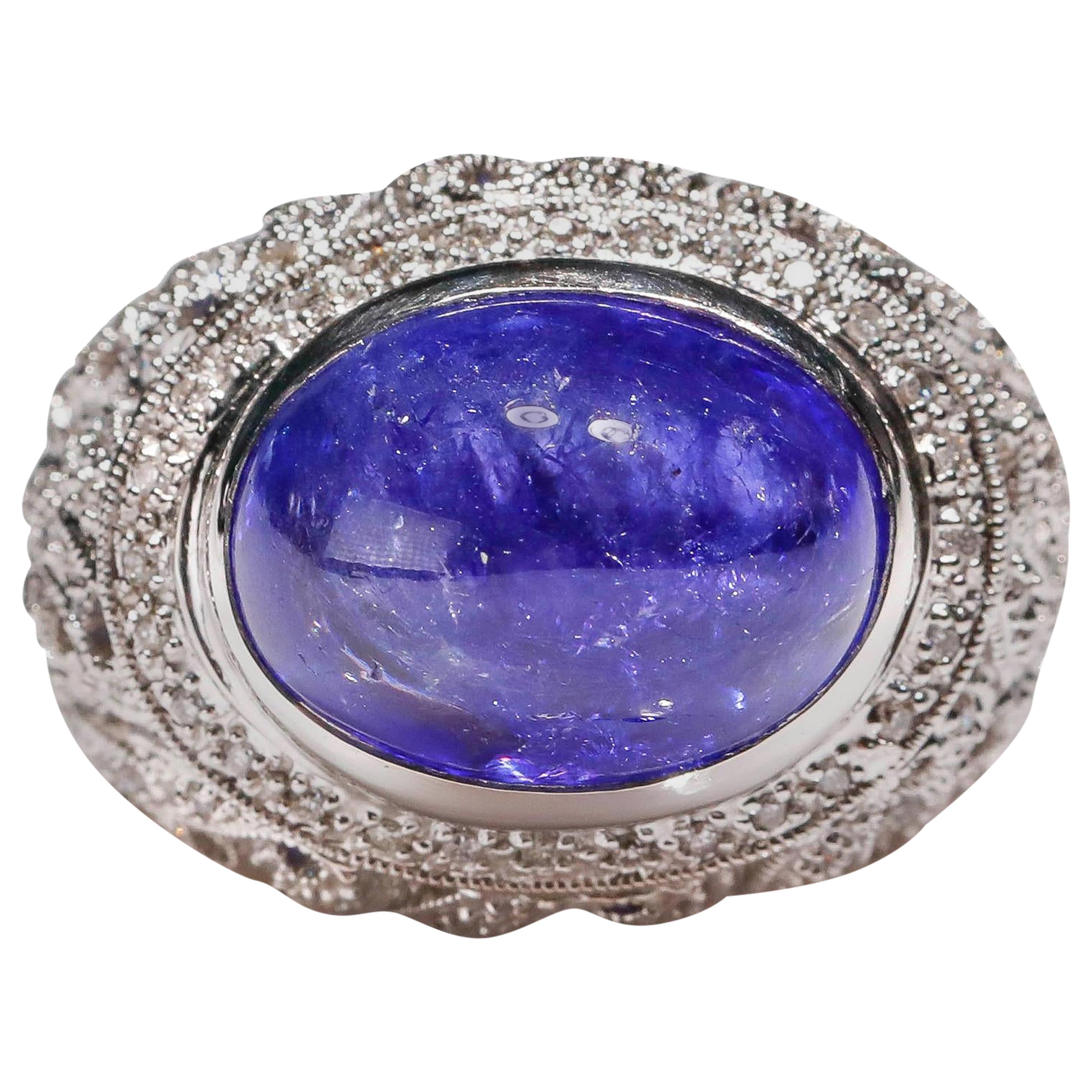 14 Karat White Gold 14 Carat Tanzanite 1.3 Ct Diamond Round Dome Cocktail Ring

Crafted in 14kt White Gold, this Unique design showcases Tanzanite designs, set in a halo of round-cut mesmerizing diamonds, Polished to a brilliant shine.

Gold Purity: