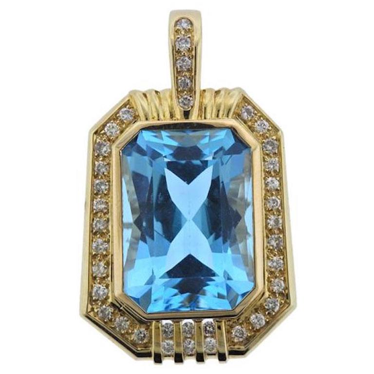 14 Karat Gold 20 Carat Blue Topaz VS Diamond Necklace Pendant For Sale