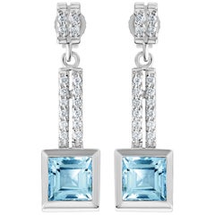14 Karat Gold 2.70 Carat Natural Blue Topaz Drop Earrings with 32 VS Diamonds