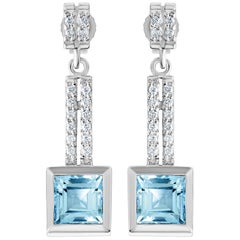 14 Karat Gold 2.70 Carat Natural Blue Topaz Drop Earrings with 32 VS Diamonds