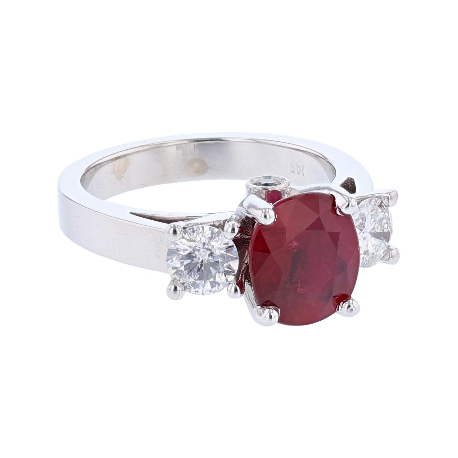 This ring is made in 14k white gold and features an Oval cut Ruby weighing 2.73ct with an AGL certificate. The certificate number is 