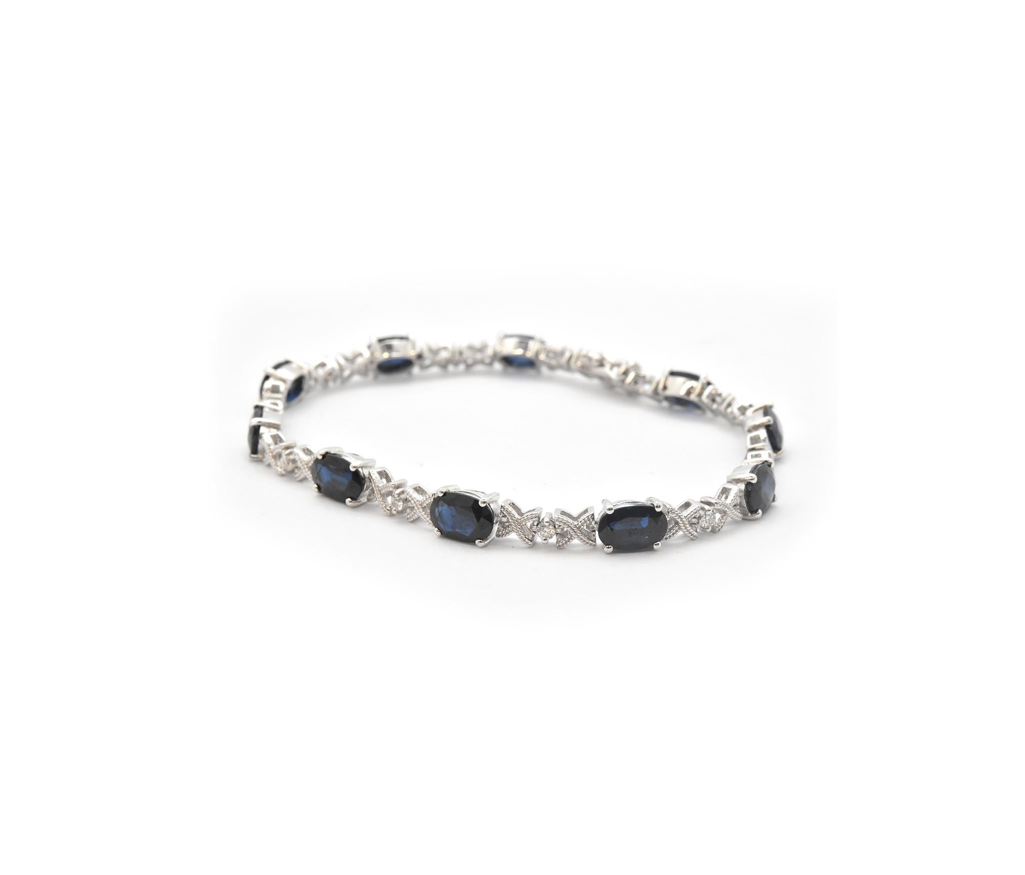 Oval Cut 14 Karat Gold 5.00 Carat Sapphire and 0.22 Carat Diamond “X” Style Bracelet