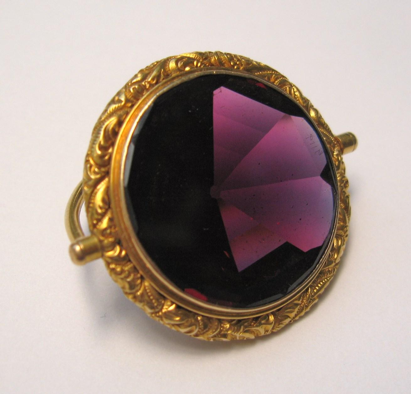 Antique 14K Gold Amethyst Pendant Fob -28 Carats Double Sided. Wonderful scrollwork surrounding the amethyst.  You can wear it either way. Measures 1.56
