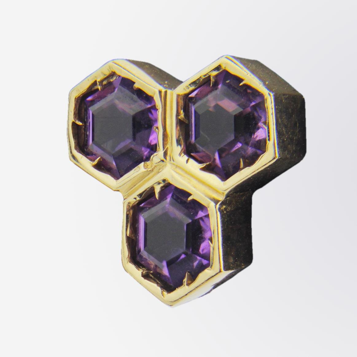 An adorable pair of 14kt yellow gold and amethyst stud earrings in honeycomb form. This pair of studs feature three richly coloured amethysts in each, and whilst relatively modern have such an interesting presence.

Diameter - 1.4cm 
