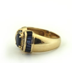Ring aus 14 Karat Gold und farbigem Stein