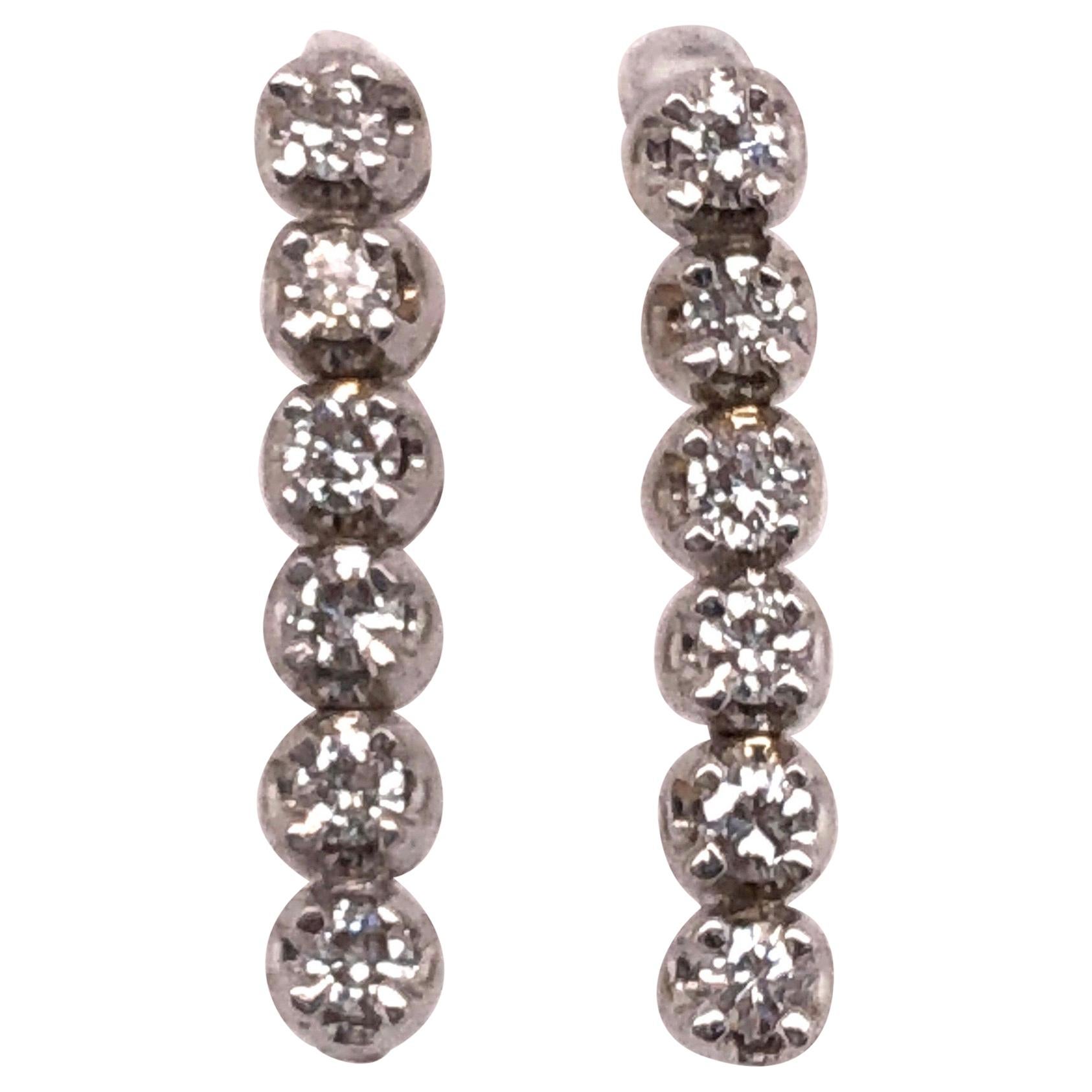 14 Karat Gold And Diamond Freestyle Drop Earrings 0.75 Total Diamond Weight For Sale