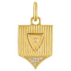 14 Karat Gold and Diamond Ribbed Shield Pendant