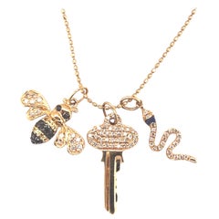 14 Karat Gold and Diamond Sydney Evans Bee, Key and Snake Charm Necklace