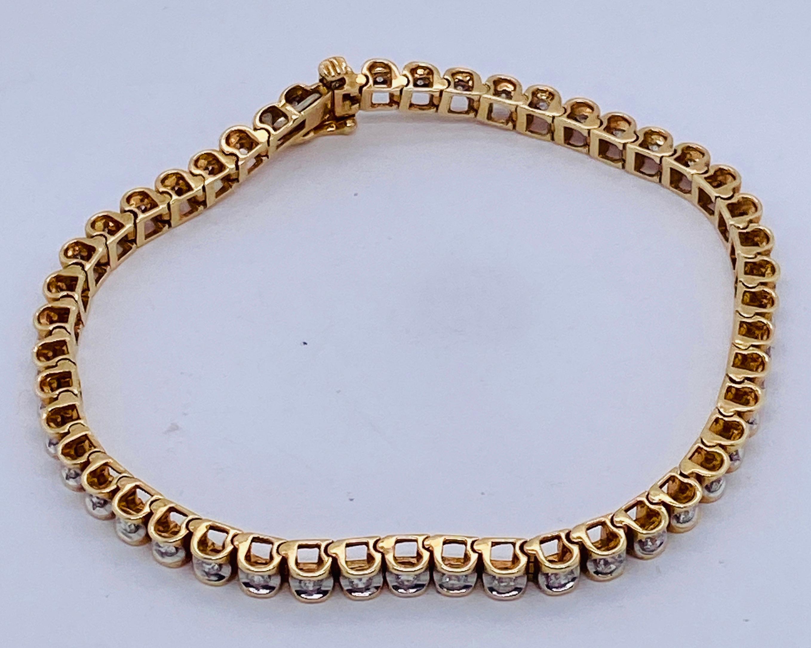 14 Karat Gold Diamond Tennis Bracelet 1.5 Carat total diamond weight. 
14kt Gold Diamond Tennis Bracelet, 1.5 tcw, 7.25