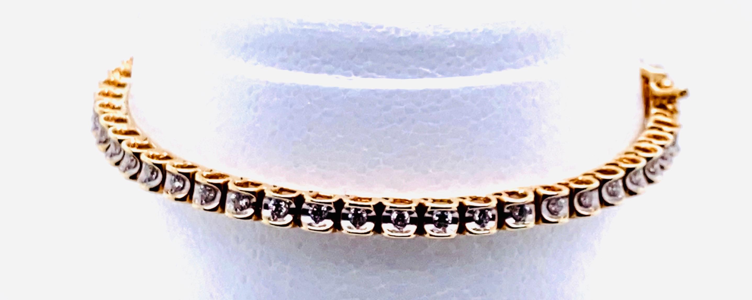 14 Karat Gold and Diamond Tennis Bracelet In Good Condition In Manhasset, NY