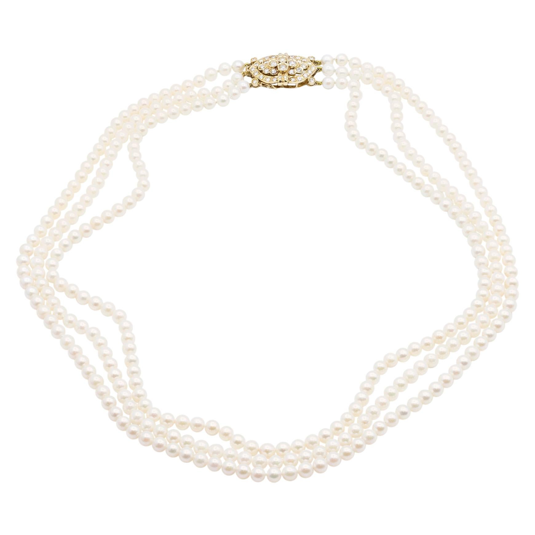 14 Karat Gold and Diamond Three Strand Freshwater Pearl Necklace For Sale