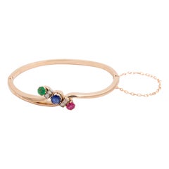 14 Karat Gold and Gemstone Bangle Bracelet