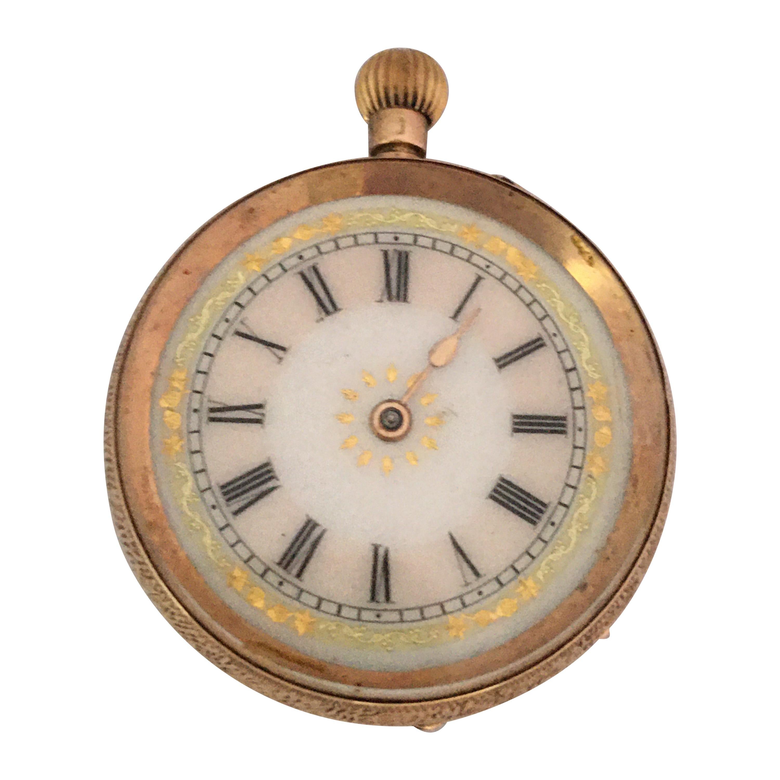 This beautiful 33mm diameter antique mechanical gold ladies watch is in good working condition and it is running well. Visible signs of ageing and wear with light marks on the glass and on the watch case as shown. The minute hand and the metal ring