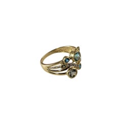 Anello in oro 14 carati con apatite, topazio, zircone, acquamarina, prasiolite e diamanti
