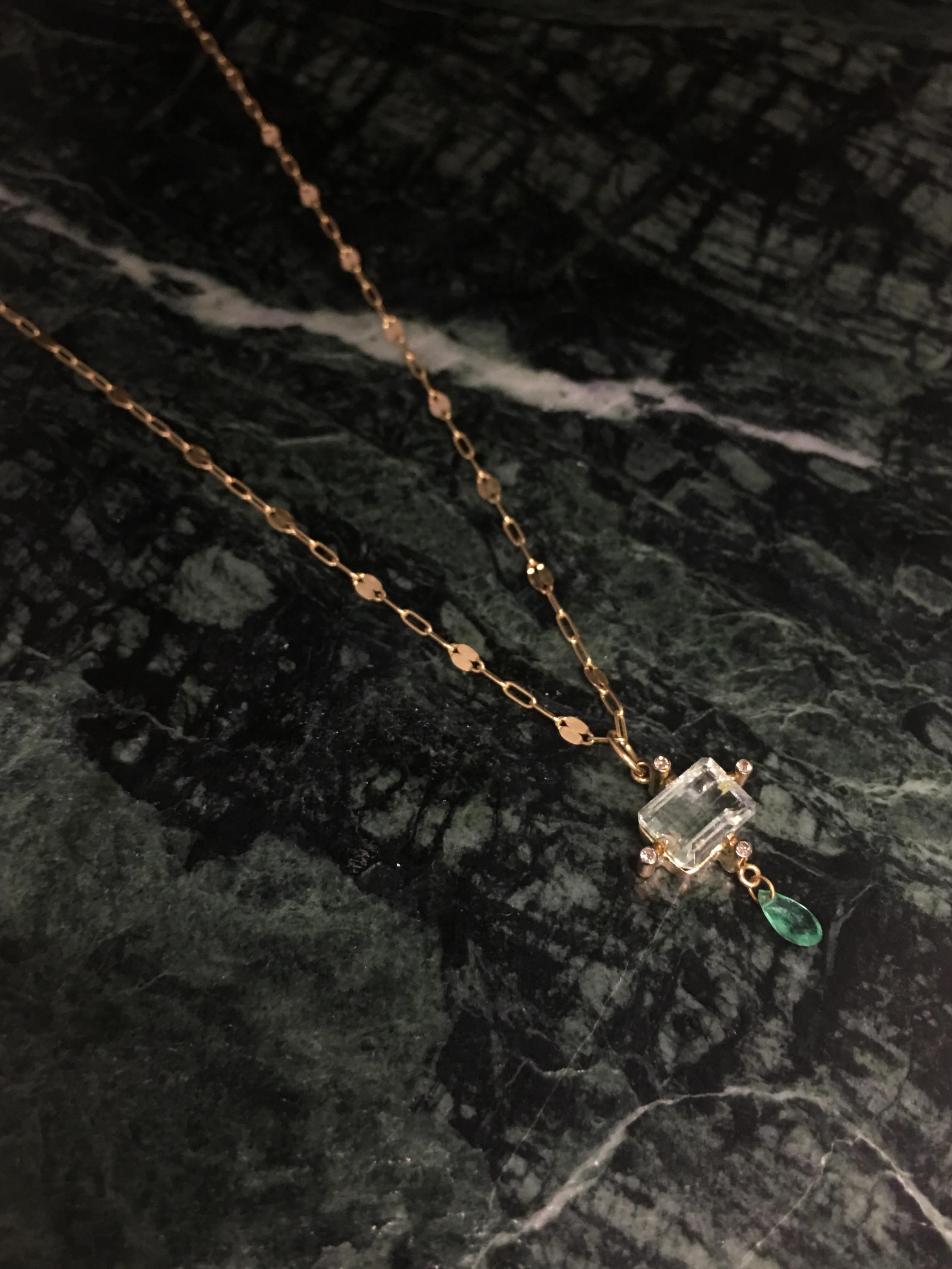 One of a kind pendant and chain designed by 5 OCTOBRE 
1,33 karats aquamarine, 0,42 karats emerald and 0,25 karats diamonds setted on 14K chain