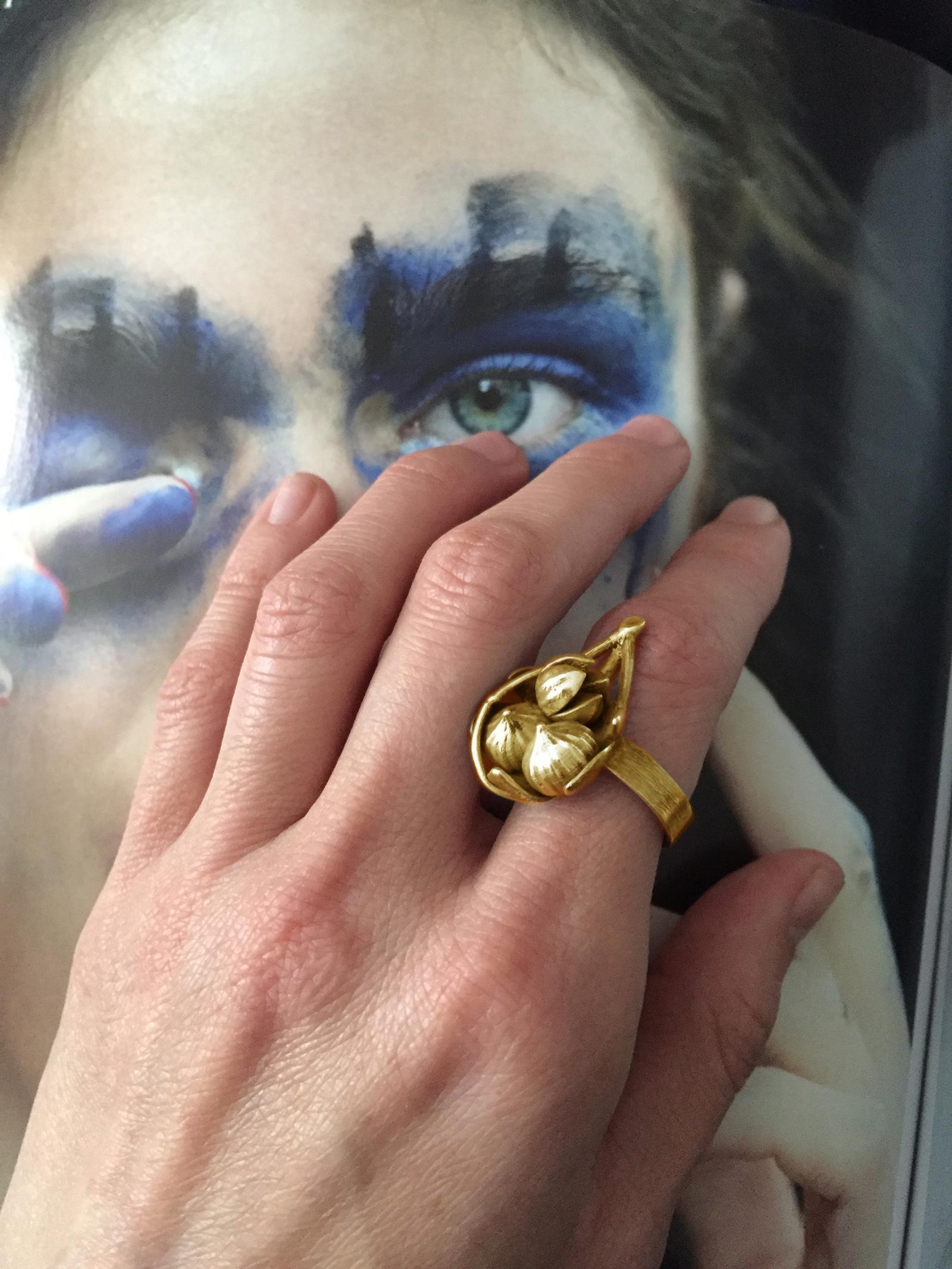 This Figs on the Leaf art nouveau cocktail ring is made of 14 karat yellow. It is limited edition collection, which was featured in Vogue UA.

It is designed by oil painter Polya Medvedeva, and was inspired by Claude Monet Nympheas, their shapes and