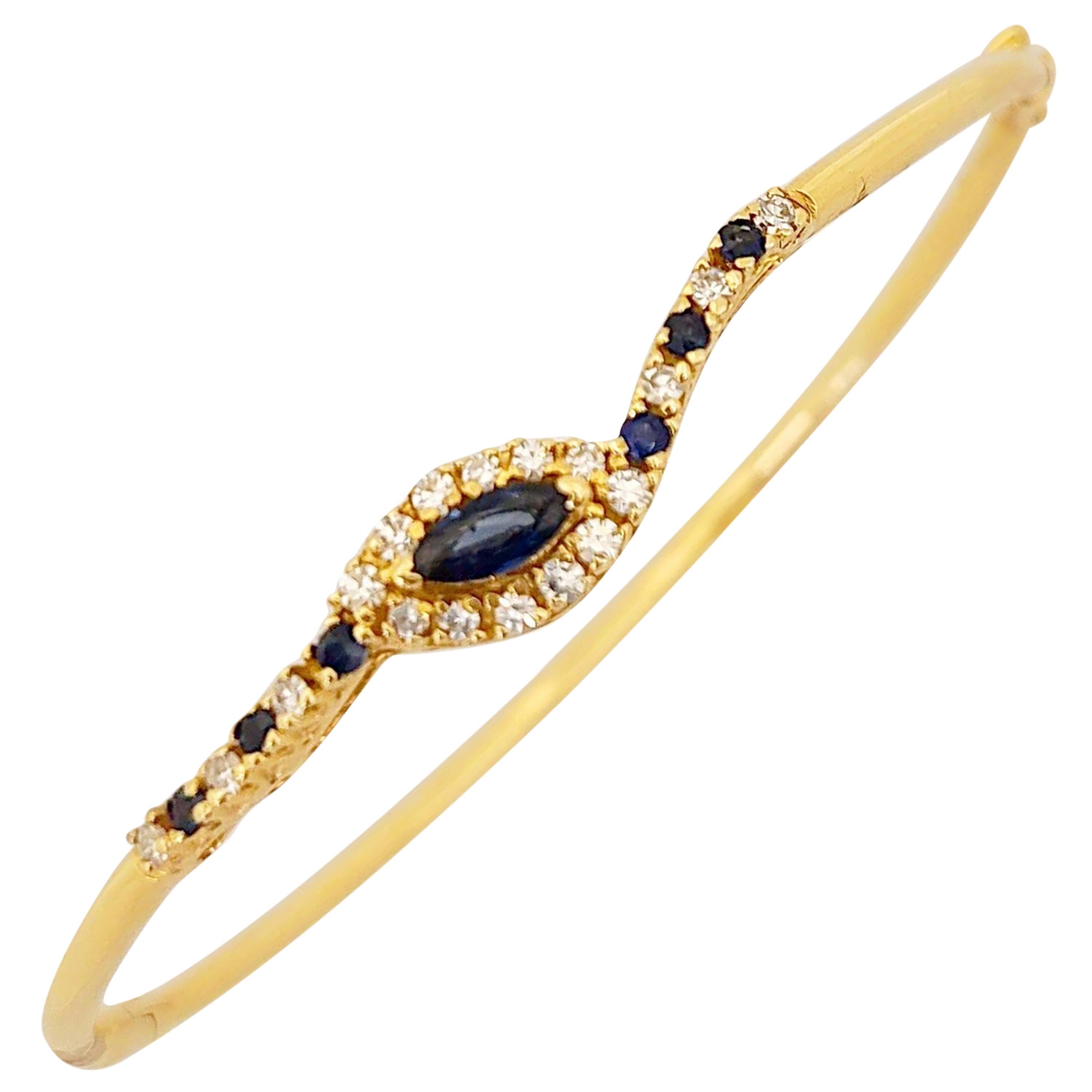 14 Karat Gold Bangle Bracelet with .85 Carat Sapphires and .33 Carat Diamonds For Sale