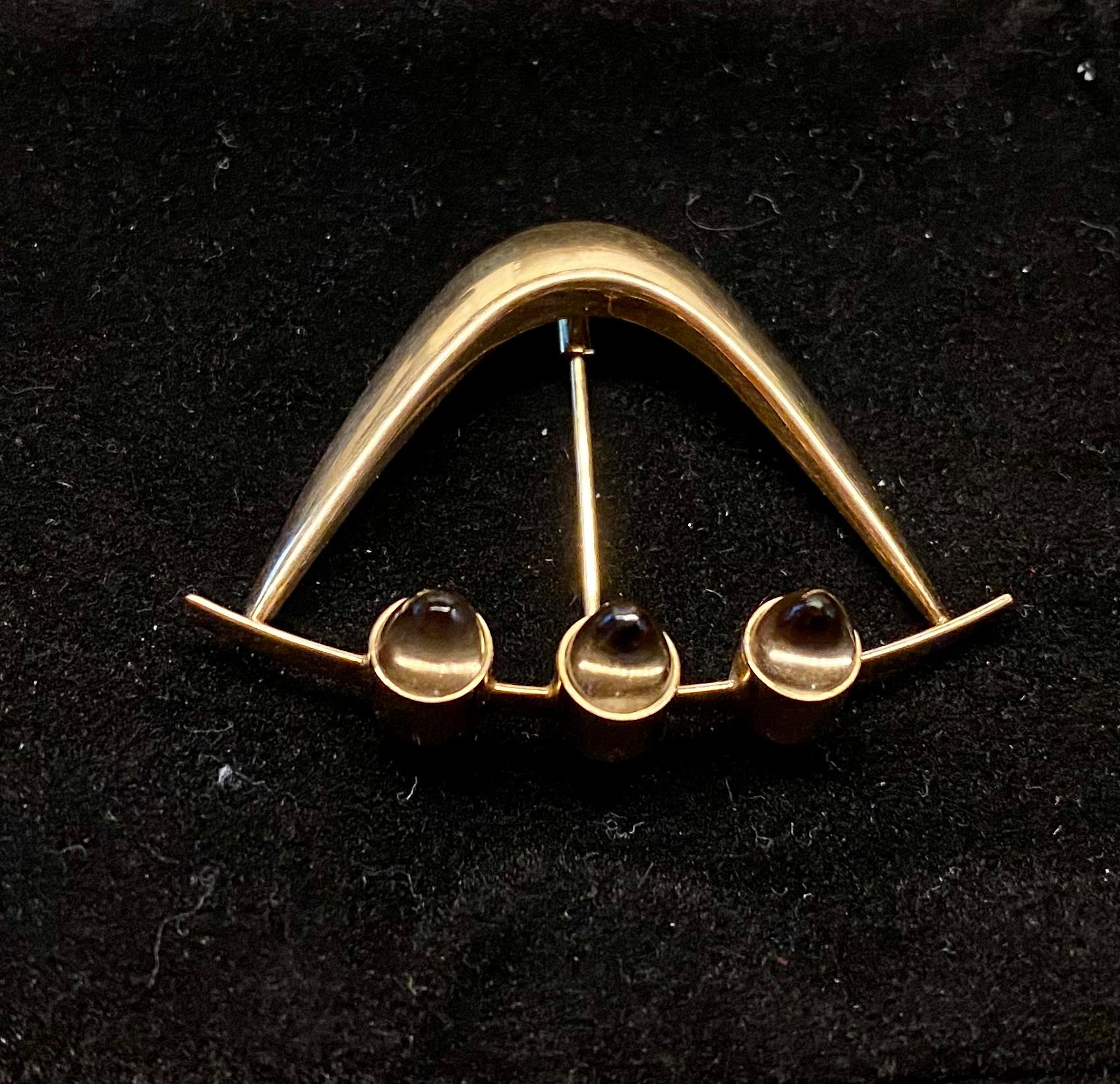 Brooch by Elis Kauppi for Kupittaan Kulta, Finland, 1958.
Fine and Rare Finland Jewelry
Smoky quartz
Gold 585
Last picture from Kupittaan Kulta old catalog.
Elis Kauppi
Uno Elis Kauppi was a Finnish jewelry designer. He was initially a student of