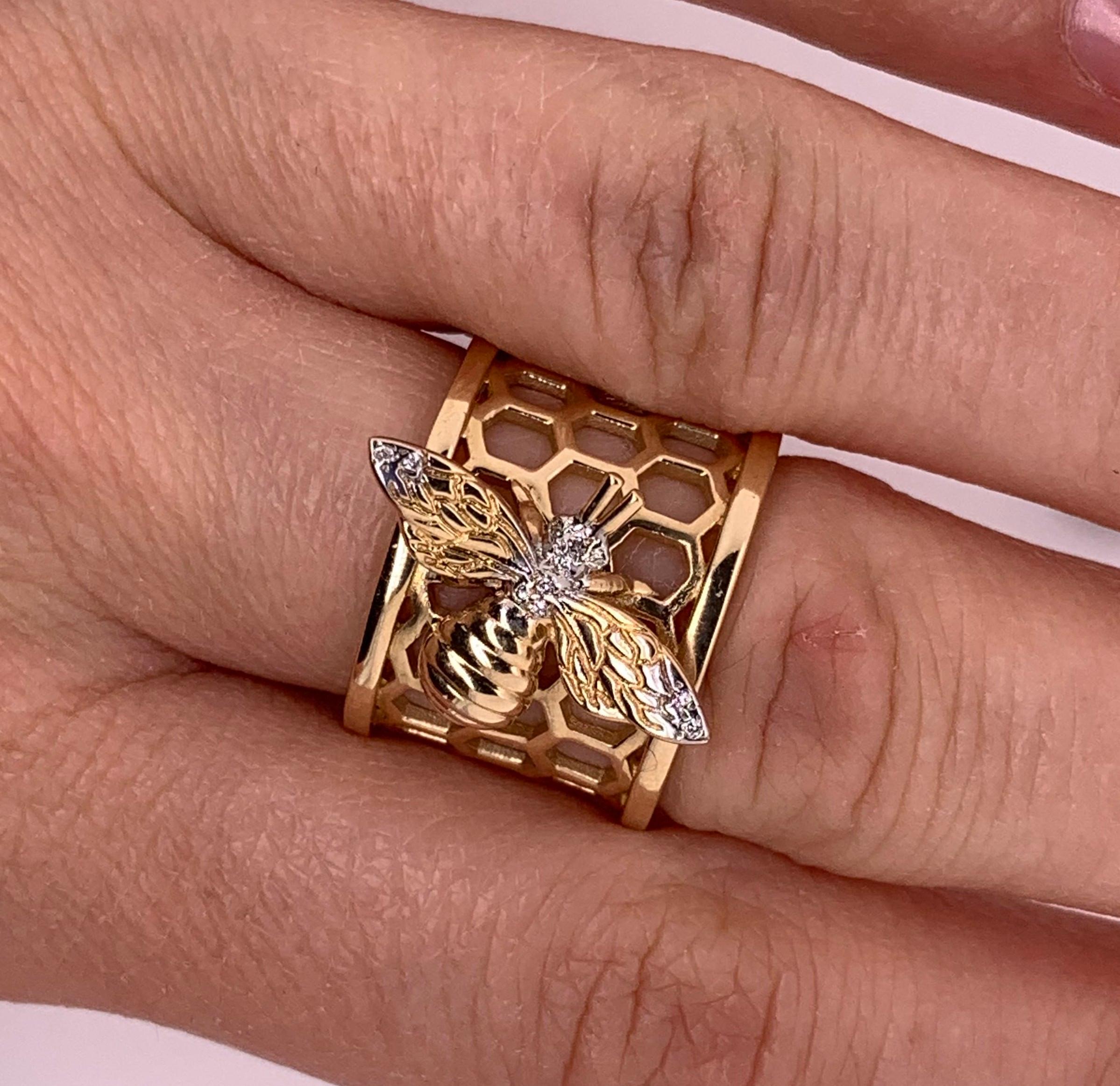 Material: 14K Yellow Gold 
Diamond Details: Brilliant Round White Diamonds at 0.05 Carats. SI Clarity / H-I Color. 
Ring Size: 6. This ring can be remade in your desired size at no additional cost - 2 week production time. 

Fine one-of-a kind