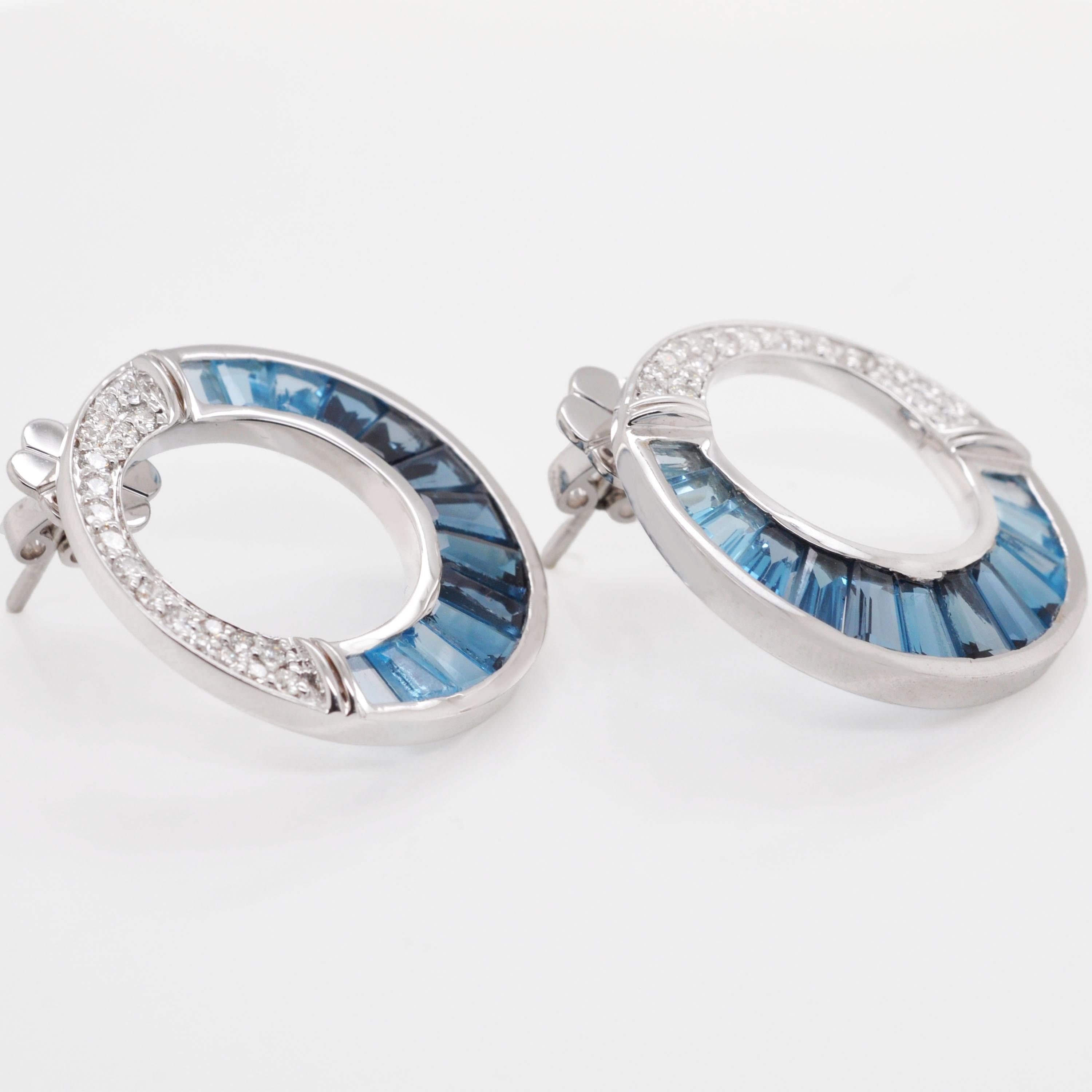 14 Karat Gold Calibre Cut Blue Topaz Baguette Diamond Circular Stud Earrings Damen im Angebot