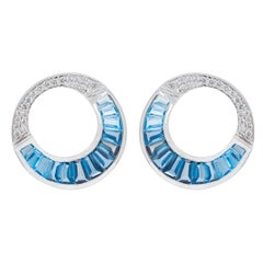 14 Karat Gold Calibre Cut Blue Topaz Baguette Diamond Circular Stud Earrings